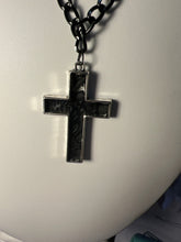 Silver plated crosses with embossed leather inside on various chains. Necklaces of faith.
