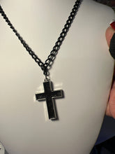 Silver plated crosses with embossed leather inside on various chains. Necklaces of faith.