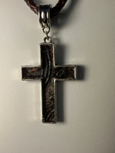 Silver plated crosses with embossed leather inside on various chains. Necklaces of faith.