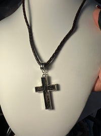 Silver plated crosses with embossed leather inside on various chains. Necklaces of faith.
