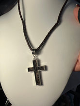 Silver plated crosses with embossed leather inside on various chains. Necklaces of faith.