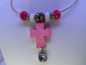 Pink cross necklace on gold plated wire with added bling