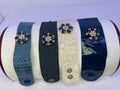 Leather bracelets in blue or cream color with blue and clear floral rhinestone embellishment