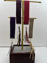 Embossed and patterned leather wrist holder key chains