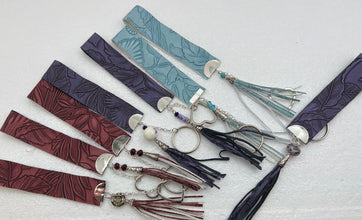 Embossed and patterned leather wrist holder key chains