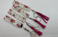 Embossed and patterned leather wrist holder key chains