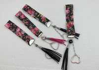Embossed and patterned leather wrist holder key chains