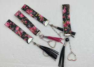 Embossed and patterned leather wrist holder key chains