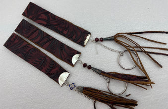 Embossed and patterned leather wrist holder key chains