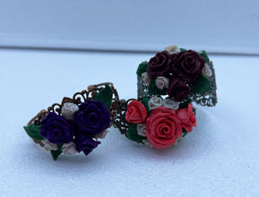 Handmade polymer clay roses on Victorian style filigree bracelets