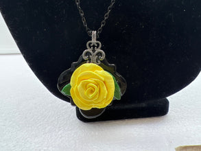 Handmade yellow polymer clay rose necklace and earring set. Black chain and accent pieces