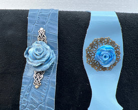 Handmade shades of blue polymer clay roses on leather bracelets