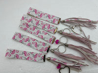 Embossed and patterned leather wrist holder key chains