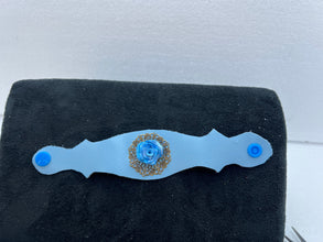 Handmade shades of blue polymer clay roses on leather bracelets