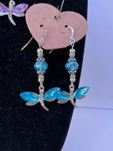 Rhinestone adorned dragonfly earrings beaded and blinged for beauty