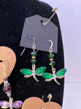 Rhinestone adorned dragonfly earrings beaded and blinged for beauty