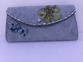Silver grey patterned leather wallet adorned with floral bling and leather lining