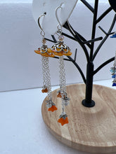 Hand painted lucite daisies in a Victorian style setting with dangling flowers earrings
