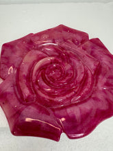 Resin rose shaped hot pads to set your table
