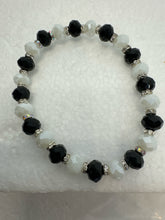 Set of 3 beaded bracelets in black and shades of white