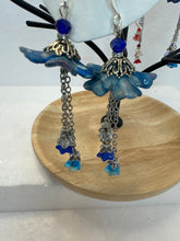 Hand painted lucite flower ear rings in Victorian fashion with chez flower dangles