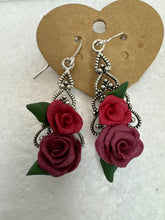 Handmade polymer clay roses on silver plated filigree teardrop pendants in earrings