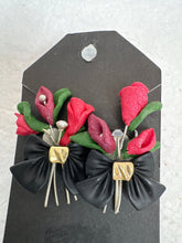 Red rose and lily handmade flower bouquet earrings secured in a black gold centered bow