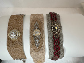 Cream and taupe lace patterned pleather bracelets adorned with Victorian style jewels