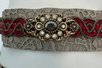 Cream and taupe lace patterned pleather bracelets adorned with Victorian style jewels