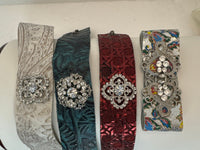 Embossed leather bracelets adorned with clear rhinestone vintage style pieces