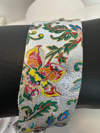 Embossed leather bracelets adorned with clear rhinestone vintage style pieces