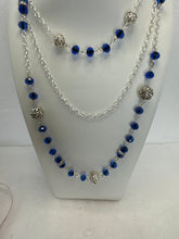 Three stranded blue bead and silver plated chain and beads