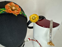 Glammed headbands. Decorated with resined flowers diamond dots and bling beads