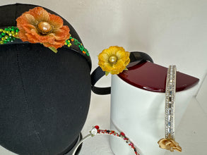Glammed headbands. Decorated with resined flowers diamond dots and bling beads