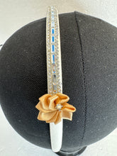 Glammed headbands. Decorated with resined flowers diamond dots and bling beads