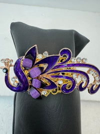 Peacock adorned bracelets in multi colors on gold or bronze adjustable bases