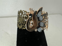 Peacock adorned bracelets in multi colors on gold or bronze adjustable bases