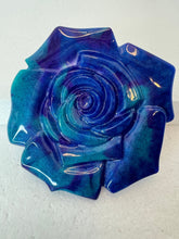 Resin rose shaped hot pads to set your table