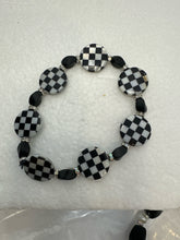 Set of 3 beaded bracelets in black and shades of white