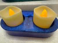 Chameleon colored resin candle holders