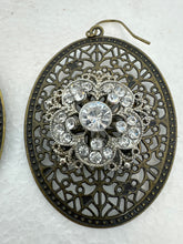Antique bronze filigree boho chic earrings with rhinestone embellishments
