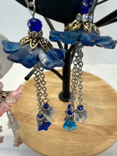 Hand painted lucite flower ear rings in Victorian fashion with chez flower dangles