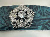 Embossed leather bracelets adorned with clear rhinestone vintage style pieces