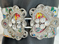 Embossed leather bracelets adorned with clear rhinestone vintage style pieces