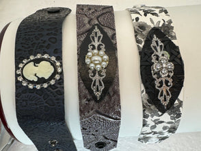 Pleather bracelets with a vintage style jewel piece