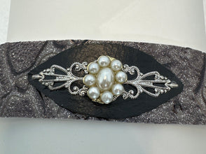 Pleather bracelets with a vintage style jewel piece