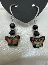 Cloisonné black butterfly earrings with another butterfly center