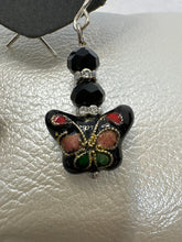 Cloisonné black butterfly earrings with another butterfly center