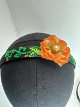 Glammed headbands. Decorated with resined flowers diamond dots and bling beads