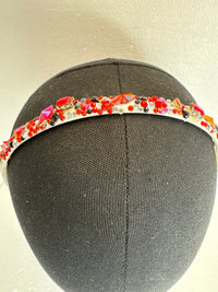 Glammed headbands. Decorated with resined flowers diamond dots and bling beads